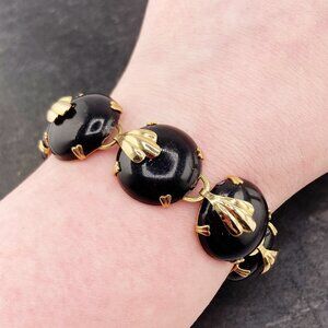 VINTAGE Black plastic and gold toned metal domed disk bracelet 1950s 1960s goth